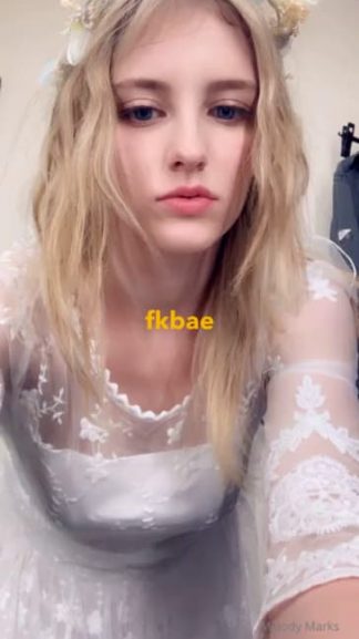 Gorgeous blonde teen bride taking off wedding dress to show Snapchat nude