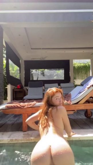 Hot naked ass Snapchat redhead masturbating in the pool under the rain
