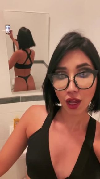 Short haired girl with glasses fingering her pussy on Snapchat in the bathroom