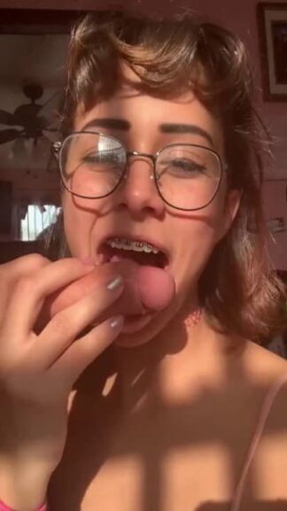 Slutty nerd with glasses and teeth braces learning how to suck cock on Snapchat and she does well
