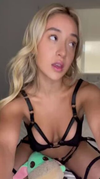 Naughty blonde with handcuffs rubbing and fingering her pussy for orgasms on Snapchat