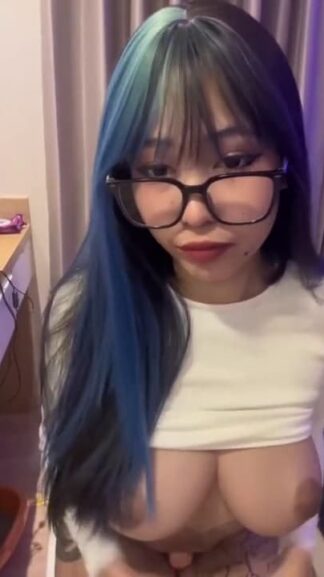 Asian cutie with big glasses and tattoos feels horny while studying Snapchat nude