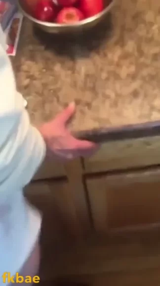 Milf in white shirt gets pounded on kitchen counter while husband talks on phone